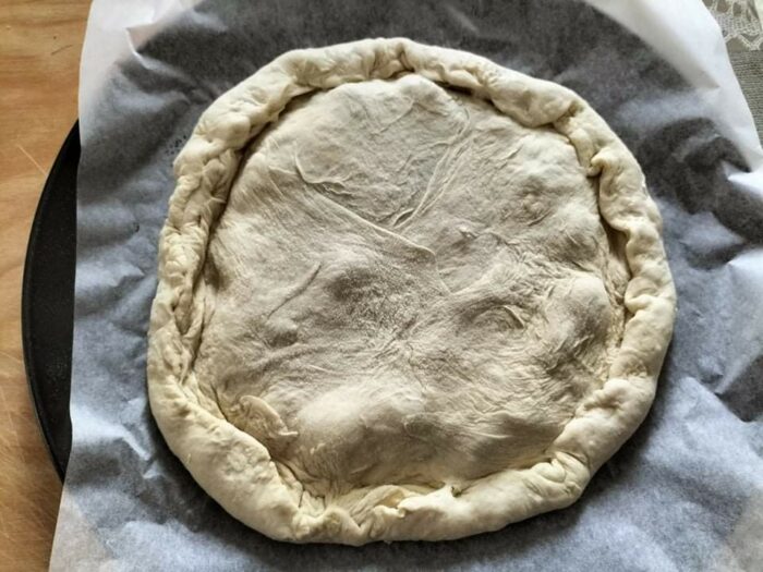 Chiusura pizza con secondo disco