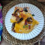 Crepes alla zucca con funghi speck e gorgonzola
