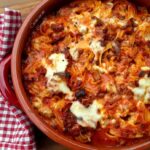 nidi al forno con carne e funghi
