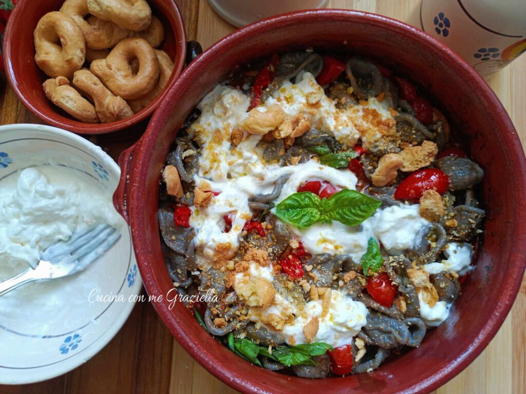 Orecchiette di grano arso con pomodorini Orecchiette di grano arso con pomodorini