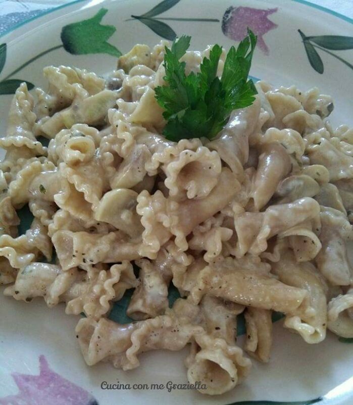 Pasta integrale con funghi e brie