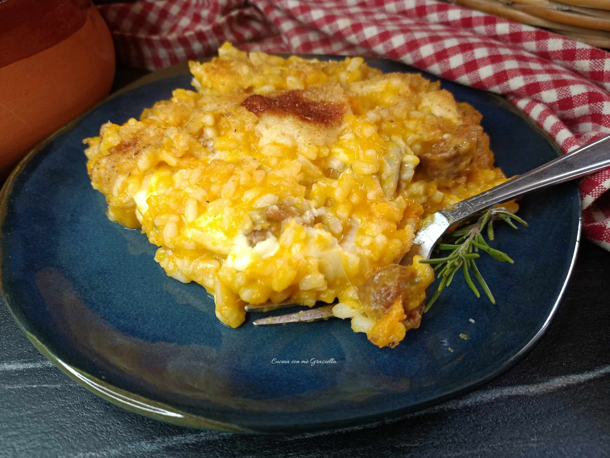 Riso al forno con zucca e salsiccia