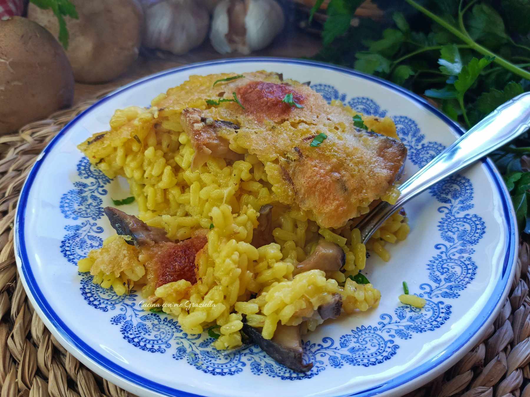 Riso al forno filante con funghi e zafferano