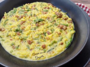 Risotto con asparagi salsiccia e zafferano