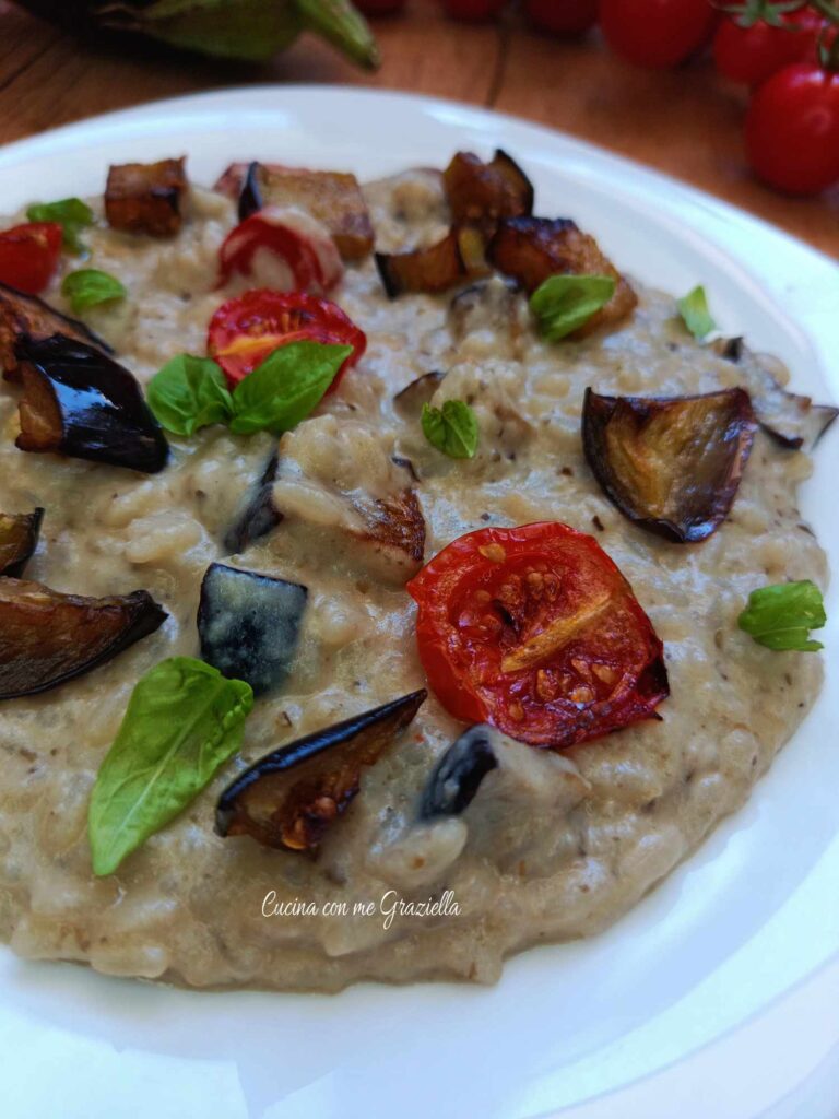 Risotto con crema di melanzane robiola e pomodorini