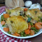 Sovracosce di pollo con carote e piselli