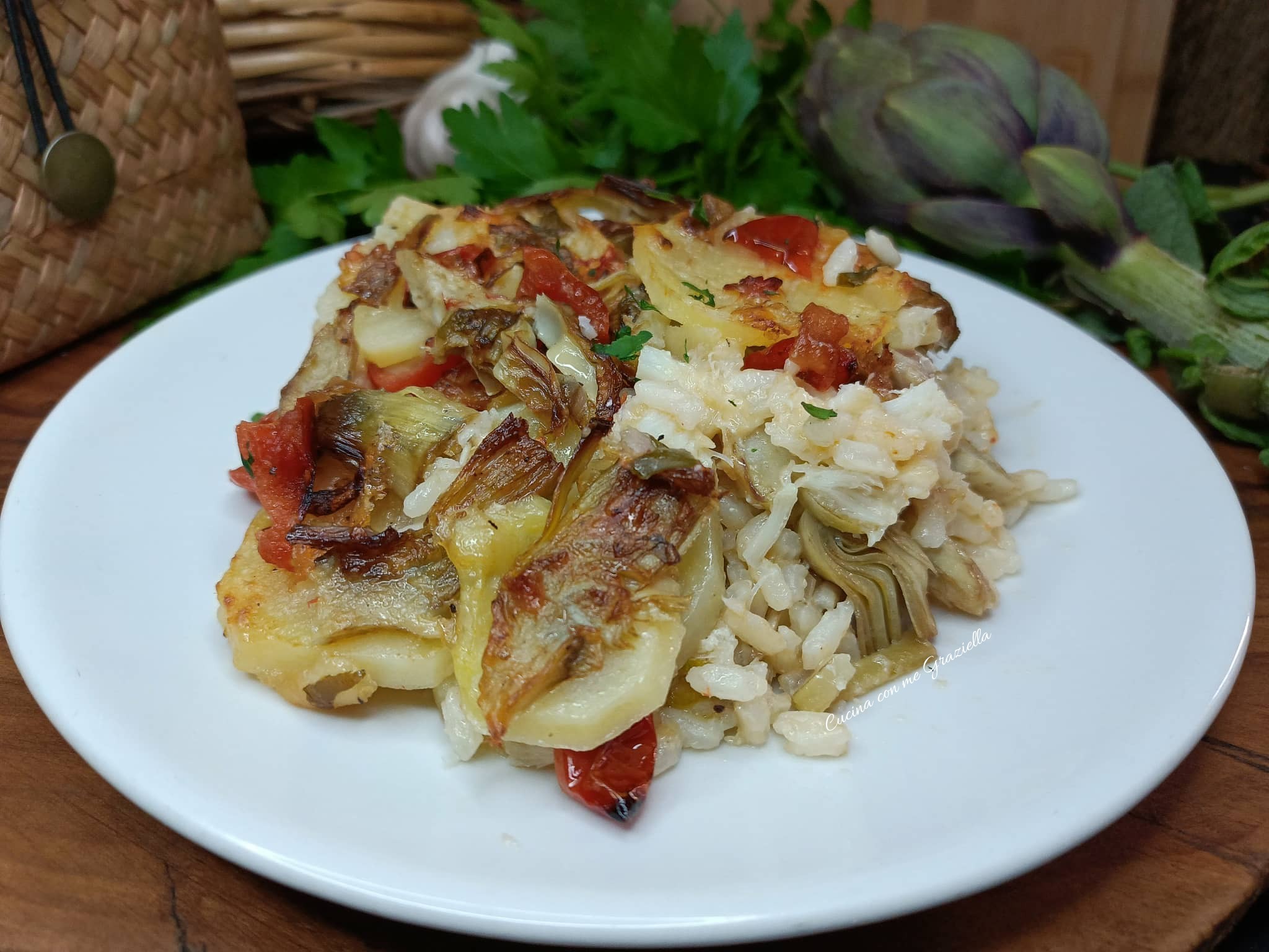 Tiella di riso patate carciofi e baccalà