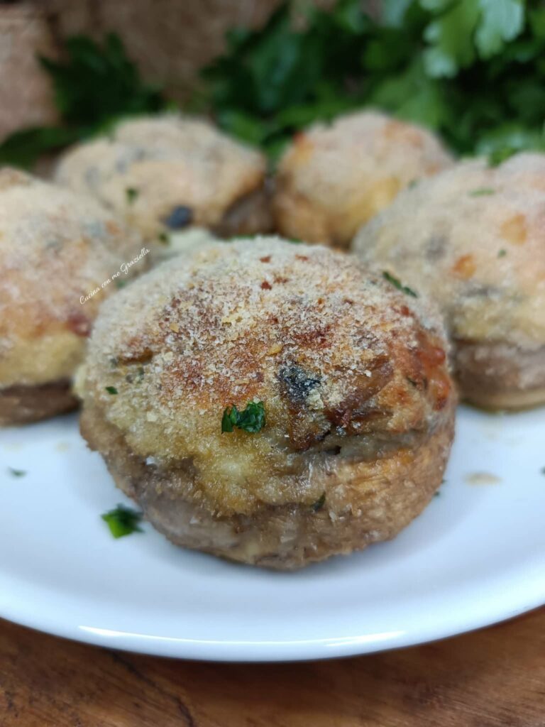 Funghi ripieni di fontina e speck
