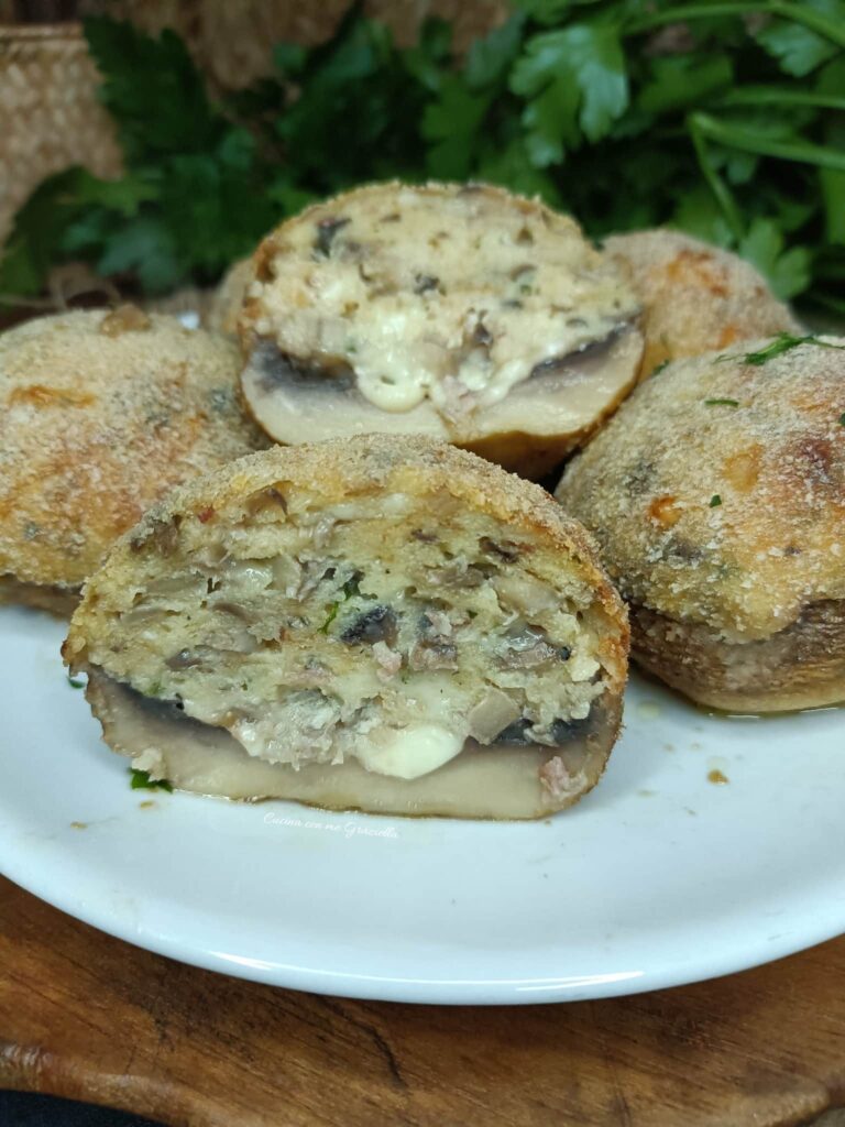 Funghi ripieni di fontina e speck