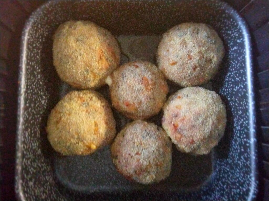 Funghi ripieni di fontina e speck