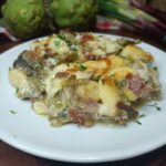 Gnocchi al forno con speck e carciofi