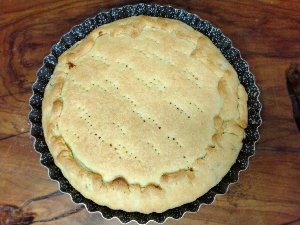 Pizza rustica salsiccia e zucchine cotta