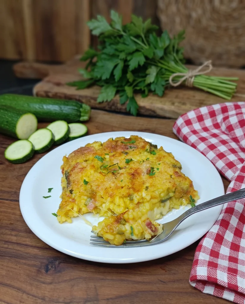 Sformato di riso allo zafferano con zucchine e speck