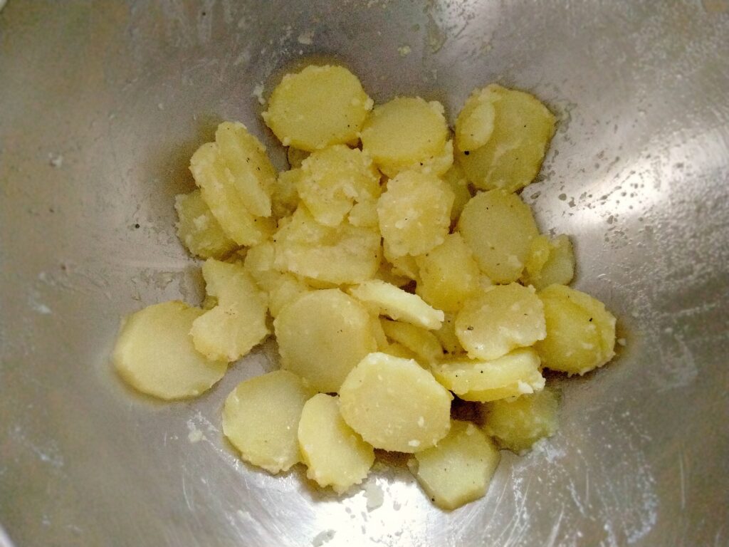 Patate lesse condite